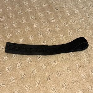 NWOT black headband with grippy non slip inside